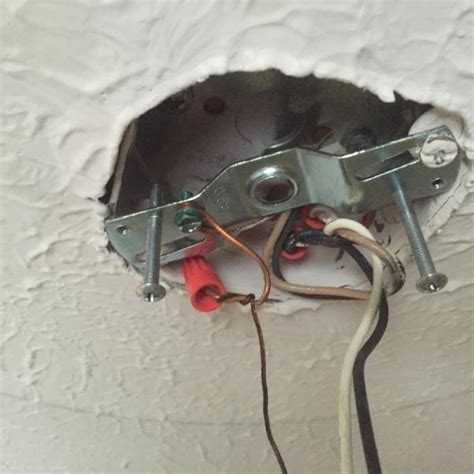 removing ceiling electrical box|loose ceiling fan electrical box.